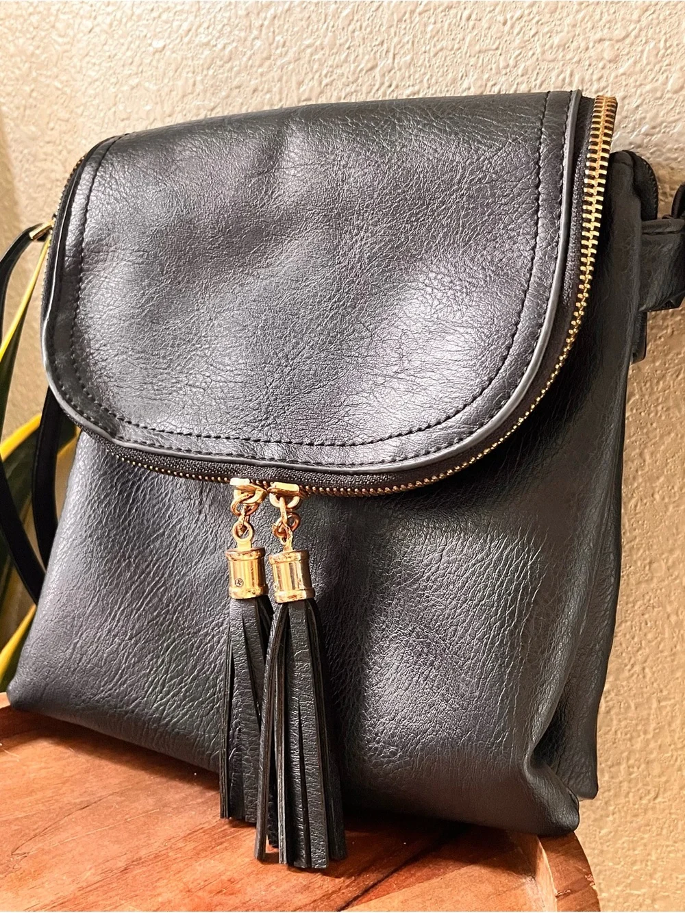 Black Tassel Hobo Crossbody Bag with Gold Accents